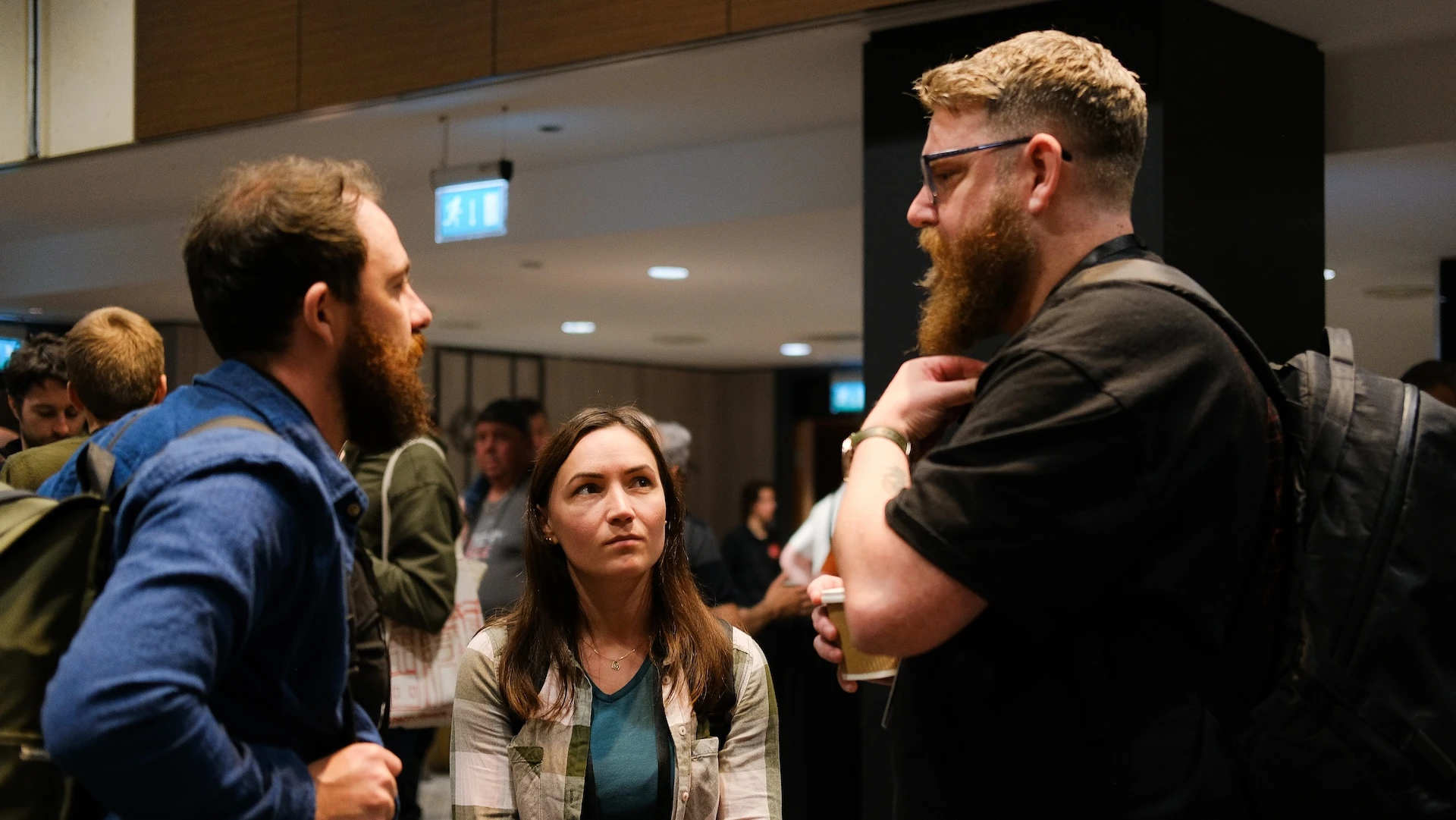 Cristina listens intently to attendee Dan at the networking segment of the event